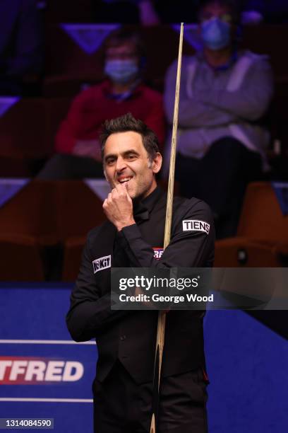 Ronnie O'Sullivan of England reacts during the Betfred World Snooker Championship Round Two match between Anthony McGill of Scotland and Ronnie...