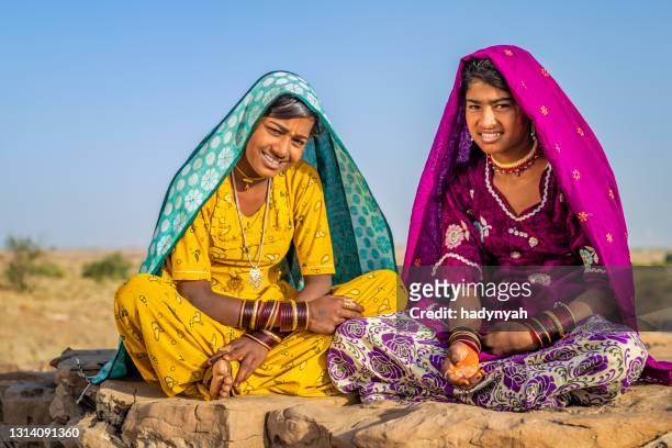 two happy gypsy indian girls, desert village, india - local gypsy stock pictures, royalty-free photos & images