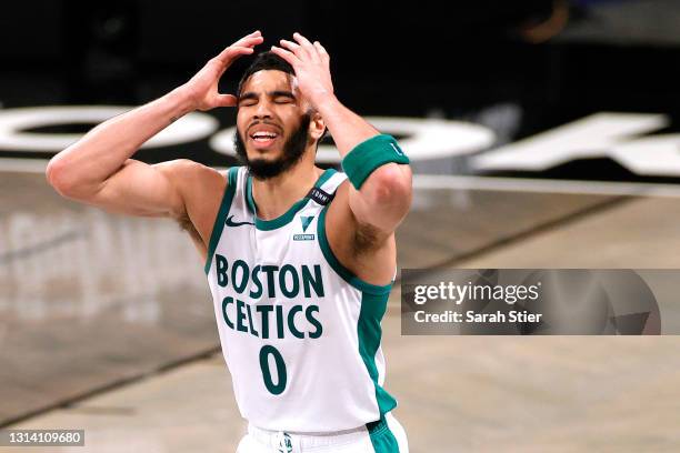 Jayson Tatum of the Boston Celtics reacts after a call during the second half against the Brooklyn Nets at Barclays Center on April 23, 2021 in the...