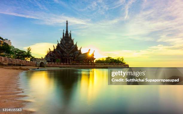 the beautiful wooden castle "sanctuary of truth" with ocean view in pattaya ,thailand - pattaya stock pictures, royalty-free photos & images