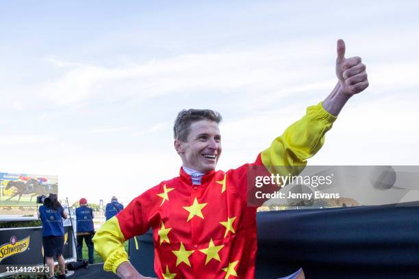 James McDonald gives the "thumbs up" after winning race 6 the Moët & Chandon Champagne Stakes during Sydney Racing at Royal Randwick Racecourse on...