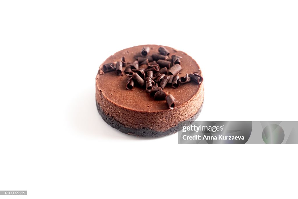 Mini chocolate cheesecake isolated on white background, selective focus