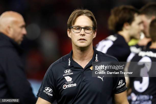 David Teague, senior coach of Carlton is seen at the 3/4 time huddle during the round six AFL match between the Carlton Blues and the Brisbane Lions...