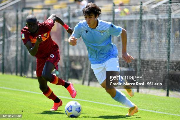 Simone Castigliani of SS Lazio competes for the ball with Maissa Codou Ndiaye of AS Roma during the Coppa Italia Primavera match between AS Roma U19...