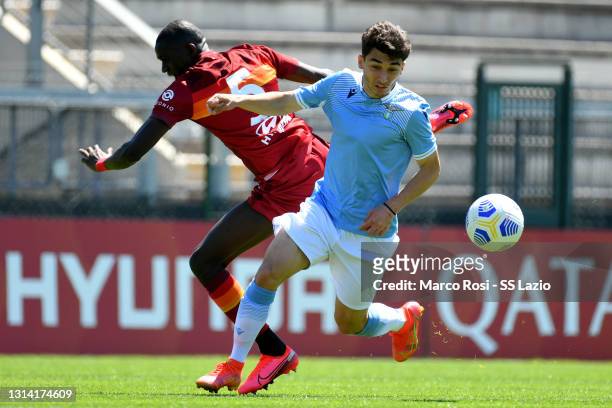 Raul Moro of SS Lazio compete for the ball with Maissa Codou Ndiaye of AS Roma during the Coppa Italia Primavera match between AS Roma U19 and SS...