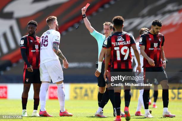 Pontus Jansson of Brentford is shown a Red Card by Match Referee John Brooks during the Sky Bet Championship match between AFC Bournemouth and...