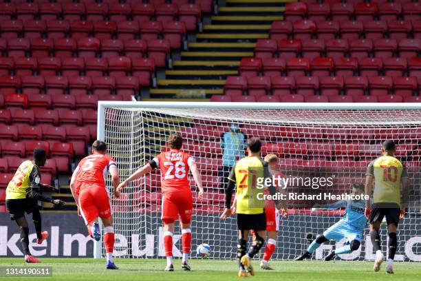 Ismaila Sarr of Watford scores their sides first goal from the penalty spot past Bartosz Bialkowski of Millwall during the Sky Bet Championship match...