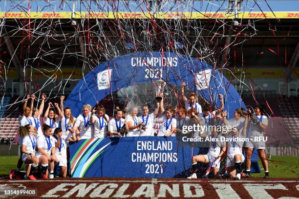 Emily Scarratt and Sarah Hunter of England lift the Six Nations Trophy following the Women's Six Nations match between England and France at The...