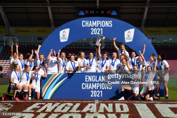 Emily Scarratt and Sarah Hunter of England lift the Six Nations Trophy following the Women's Six Nations match between England and France at The...