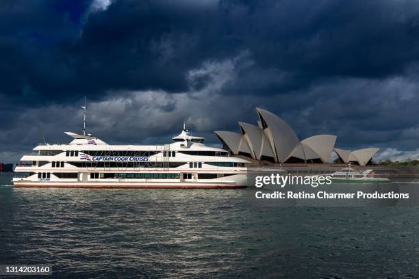 sydney opera house and ferry as seen from harbor area, new south wales - sydney skyline opera house and harbor bridge imagens e fotografias de stock