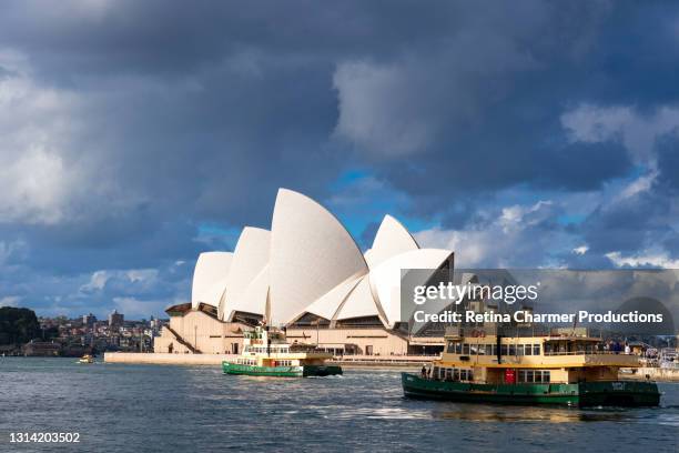 sydney opera house and ferries as seen from harbor area, new south wales - sydney skyline opera house and harbor bridge imagens e fotografias de stock