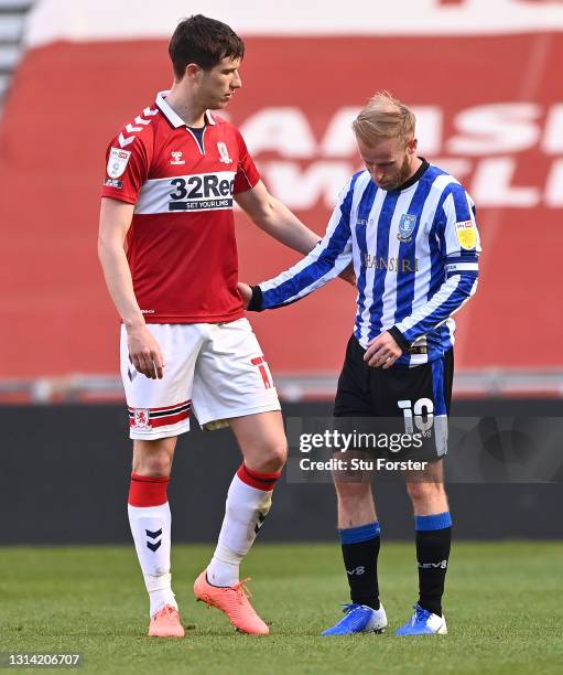 Sheffield Wednesday captain Barry Bannan is consoled by Paddy McNair of Middlesbrough on the final whistle after the Sky Bet Championship match...