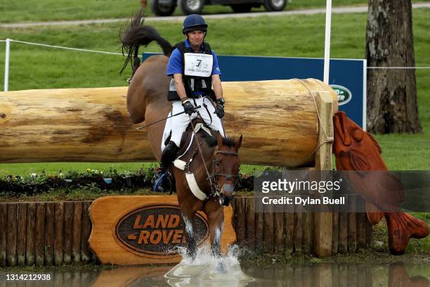Phillip Dutton atop Fernhill Singapore competes in the Cross Country Phase during the Land Rover Kentucky Three-Day Event at Kentucky Horse Park on...
