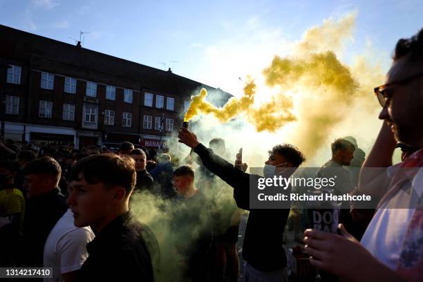 Watford fans celebrate promotion to the Premier League in the town centre after the Sky Bet Championship match between Watford and Millwall at...