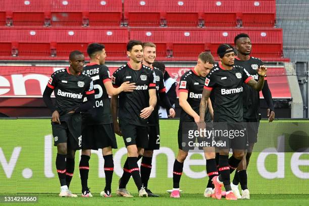 Lucas Alario of Bayer Leverkusen celebrates with teammates after scoring their team's second goal during the Bundesliga match between Bayer 04...