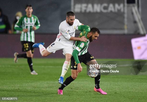 Daniel Carvajal of Real Madrid and Borja Iglesias of Real Betis battle for the ball during the La Liga Santander match between Real Madrid and Real...