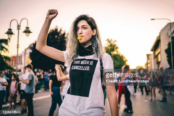 young female protester - justice concept stock pictures, royalty-free photos & images