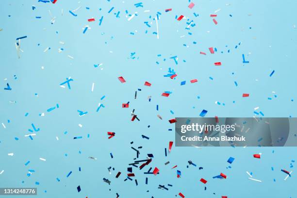 red, blue and silver abstract glitter confetti background. happy independence day of united states greeting card. - blue confetti stockfoto's en -beelden