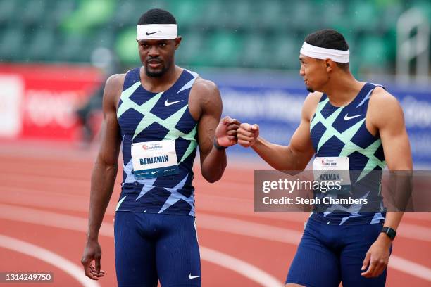 Rai Benjamin and Michael Norman fist bump before the 400 meter final during the USATF Grand Prix at Hayward Field on April 24, 2021 in Eugene, Oregon.