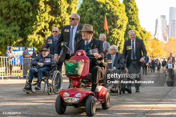War veterans are seen marching during the Anzac Day march at the Shrine of Remembrance on April 25, 2021 in Melbourne, Australia. Anzac day is a...