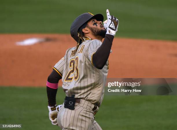 Fernando Tatis Jr. #23 of the San Diego Padres celebrates his solo homerun, to take a 1-0 lead, during the first inning at Dodger Stadium on April...