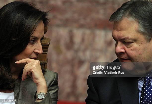 Education Minister Anna Diamantopoulou and Finance Minister Evangelos Venizelos talk ahead of the confidence vote for the government of Prime...