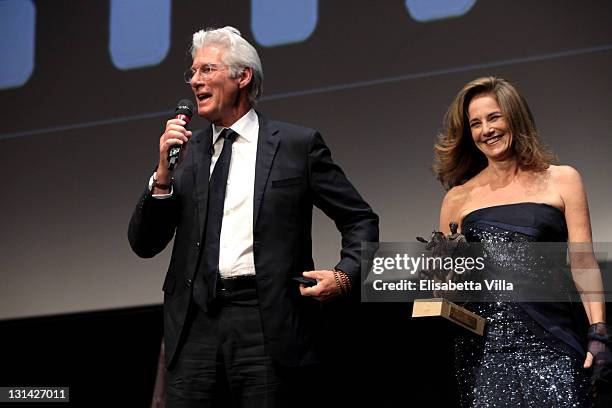 Actor Richard Gere as he accepts his Marc' Aurelio award for Lifetime Achievement and Jury member Debra Winger during the Closing Ceremony of the 6th...