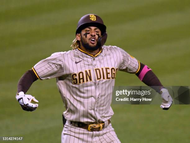 Fernando Tatis Jr. #23 of the San Diego Padres reacts to his solo homerun, his second of the game, to take a 3-2 lead over the Los Angeles Dodgers...