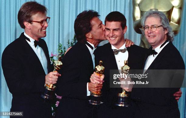 Rain Man" Oscar winners backstage : Mark Johnson, Best Picture, Dustin Hoffman, Best Actor, movie co-star Tom Cruise and Best Director Barry...