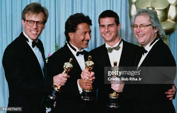 Rain Man" Oscar winners backstage : Mark Johnson, Best Picture, Dustin Hoffman, Best Actor, movie co-star Tom Cruise and Best Director Barry...
