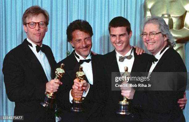 Rain Man" Oscar winners backstage : Mark Johnson, Best Picture, Dustin Hoffman, Best Actor, movie co-star Tom Cruise and Best Director Barry...