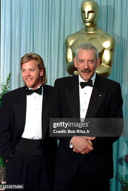 Kiefer Sutherland and his father Donald Sutherland backstage at the 61st Annual Academy Awards Show, March 29, 1989 in Los Angeles, California.