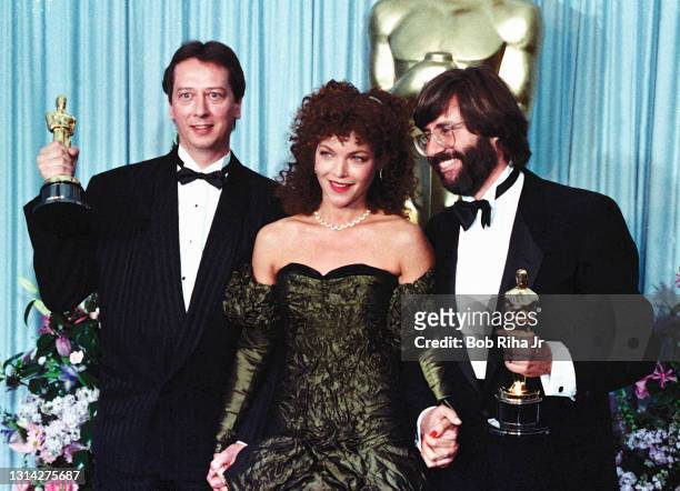 Presenter Amy Irving with Oscar Winners Ronald Bass and Barry Morrow for Best Screenplay at the 61st Annual Academy Awards Show, March 29, 1989 in...