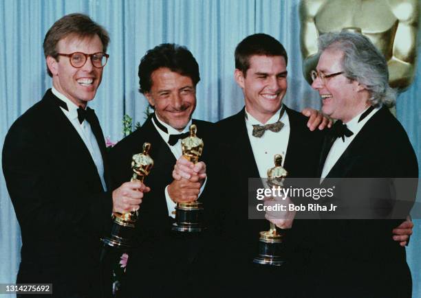 Rain Man" Oscar winners backstage : Mark Johnson, Best Picture, Dustin Hoffman, Best Actor, movie co-star Tom Cruise and Best Director Barry...