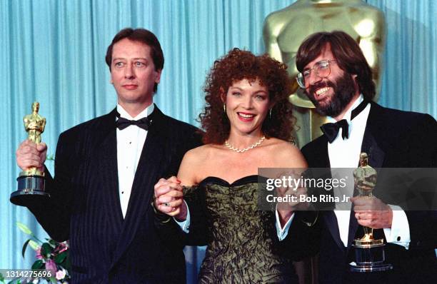 Presenter Amy Irving with Oscar Winners Ronald Bass and Barry Morrow for Best Screenplay "Rain Man" at the 61st Annual Academy Awards Show, March 29,...