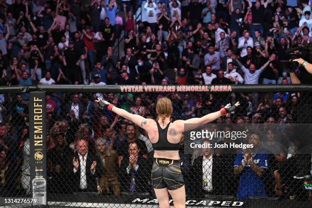 Valentina Shevchenko of Kyrgyzstan reacts after defeating Jessica Andrade of Brazil in their UFC women's flyweight championship bout during the UFC...
