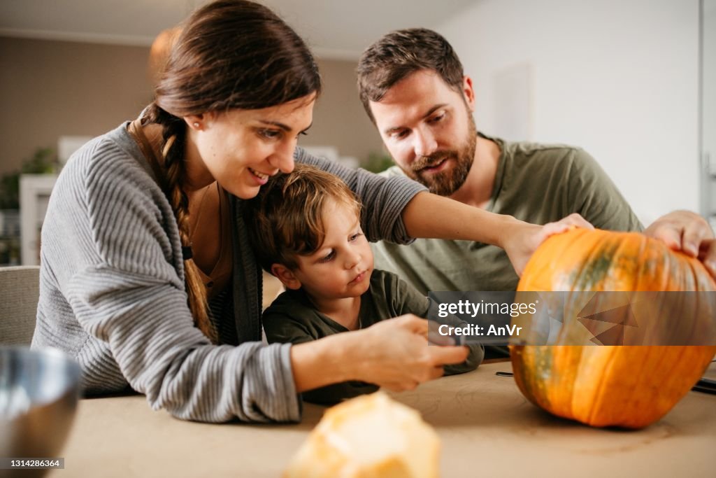 Family pumpkin carving for haloween