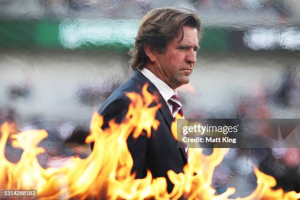 Sea Eagles coach Des Hasler walks onto the field for an Anzac Day ceremony prior to the round seven NRL match between the Wests Tigers and the Manly...