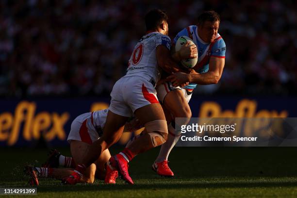Brett Morris of the Roosters is tackled during the round seven NRL match between the Sydney Roosters and the St George Illawarra Dragons at the...
