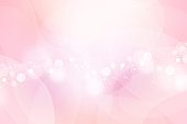 Shining round bokeh pink background