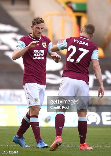 Chris Wood of Burnley celebrates with Matej Vydra after scoring their team's first goal during the Premier League match between Wolverhampton...