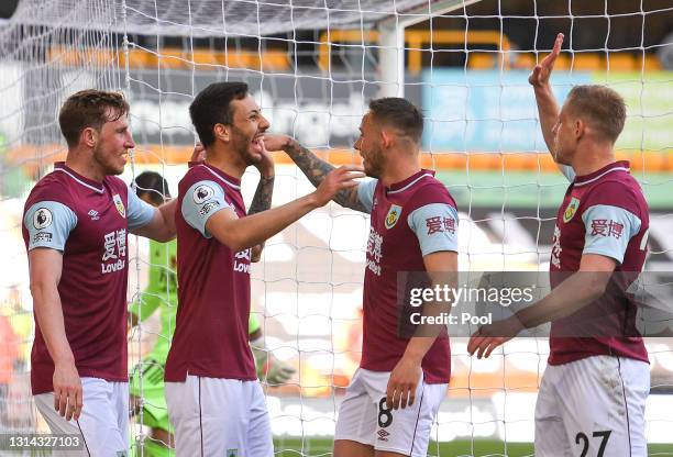 Chris Wood of Burnley celebrates with teammates Dwight McNeil, Josh Brownhill and Matej Vydra after scoring their team's second goal during the...