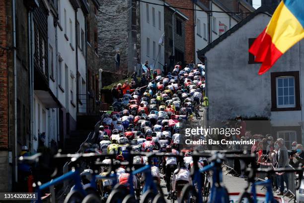 The Peloton passing through Côte de Saint-Roch in Houffalize City during the 107th Liege - Bastogne - Liege 2021, Men's Elite a 259,5km race from...