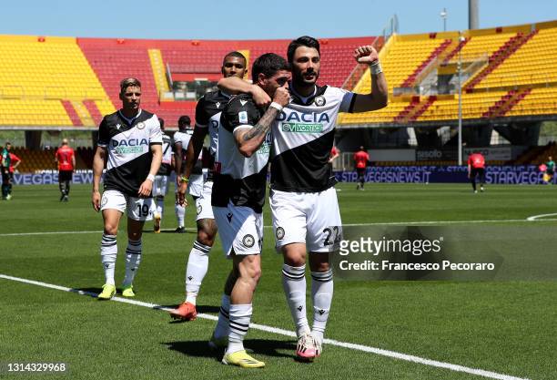 Tolgay Arslan of Udinese Calcio celebrates with Rodrigo De Paul after scoring their side's second goal during the Serie A match between Benevento...