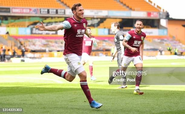 Chris Wood of Burnley celebrates after scoring their side's third goal and his hat trick during the Premier League match between Wolverhampton...