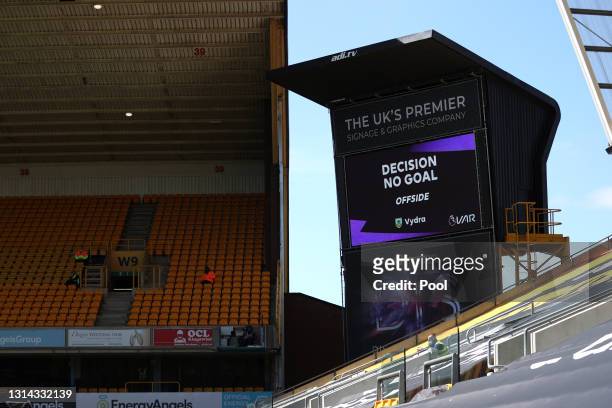 Screen inside the stadium displays the decision of 'No Goal' after a VAR review for a possible offside during the Premier League match between...