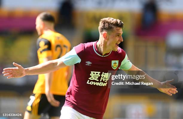 Ashley Westwood of Burnley celebrates after scoring their side's fourth goal during the Premier League match between Wolverhampton Wanderers and...