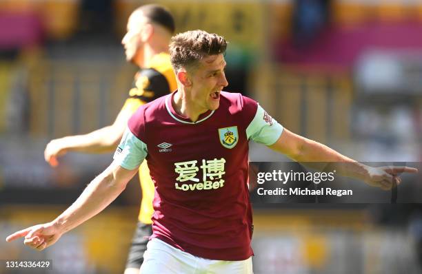 Ashley Westwood of Burnley celebrates after scoring their side's fourth goal during the Premier League match between Wolverhampton Wanderers and...