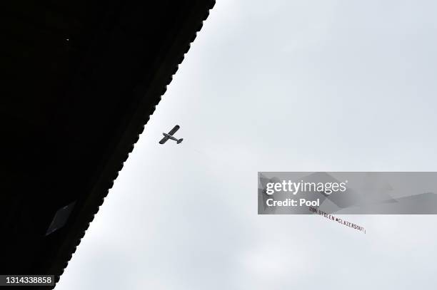 Plane with a banner that reads "2bn Stolen Glazers Out" on is flown over the ground prior to the Premier League match between Leeds United and...