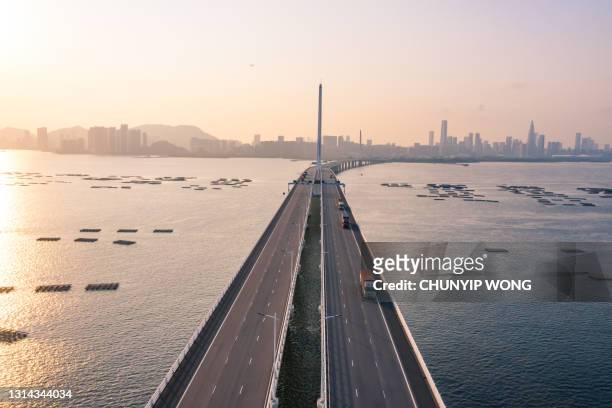 view of the shenzhen bay bridge - shenzhen stock pictures, royalty-free photos & images